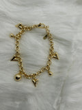 Pulsera con dijes de corazón